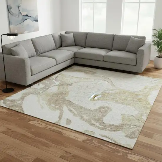Ivory Beige And Gold Abstract Washable Area Rug With UV Protection Photo 2