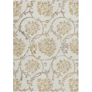 Photo of Ivory Beige And Gold Floral Washable Indoor Outdoor Area Rug