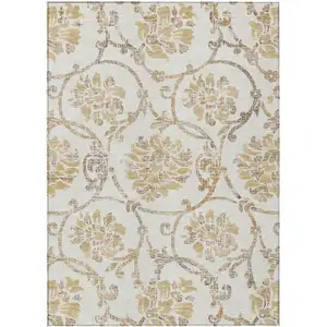 Photo of Ivory Beige And Gold Floral Washable Indoor Outdoor Area Rug