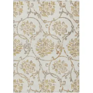 Photo of Ivory Beige And Gold Floral Washable Indoor Outdoor Area Rug