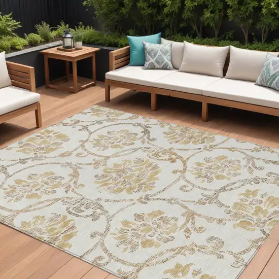 Ivory Beige And Gold Floral Washable Indoor Outdoor Area Rug Photo 1