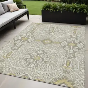 Photo of Ivory Beige And Gold Floral Washable Indoor Outdoor Area Rug