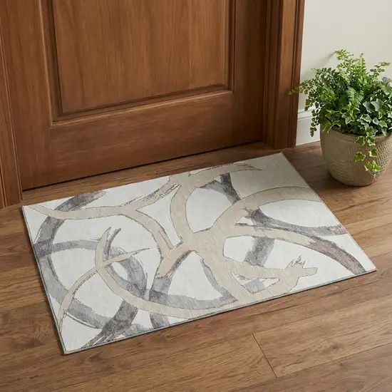 Ivory Beige And Gray Abstract Washable Area Rug With UV Protection Photo 1