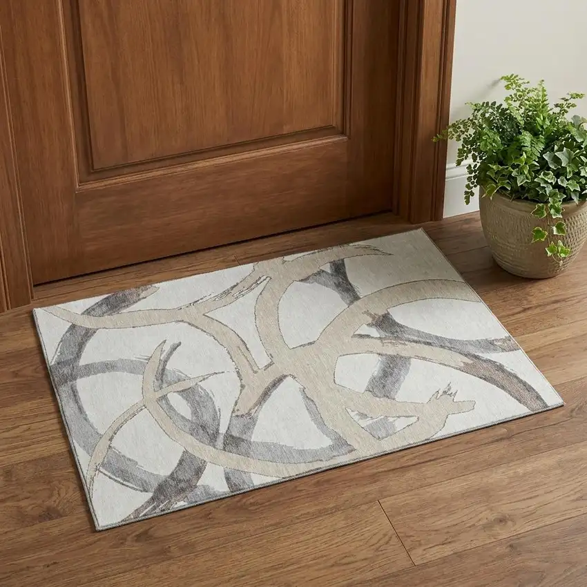 Ivory Beige And Gray Abstract Washable Area Rug With UV Protection Photo 1