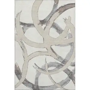 Photo of Ivory Beige And Gray Abstract Washable Area Rug With UV Protection