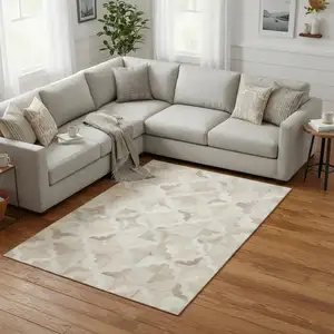 Photo of Ivory Beige And Gray Geometric Washable Area Rug With UV Protection
