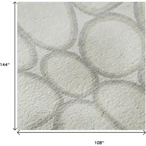 Photo of Ivory Beige And Gray Geometric Washable Area Rug With UV Protection