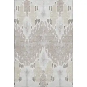 Photo of Ivory Beige And Gray Ikat Washable Area Rug With UV Protection