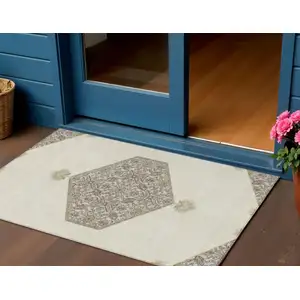 Photo of Ivory Beige And Gray Oriental Washable Indoor Outdoor Area Rug