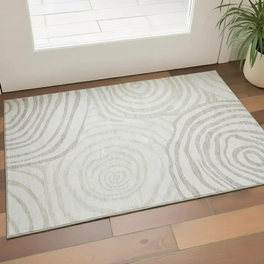Ivory Beige And Khaki Abstract Washable Area Rug With UV Protection Photo 1