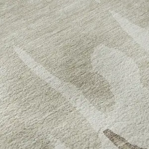 Photo of Ivory Beige And Khaki Abstract Washable Area Rug With UV Protection