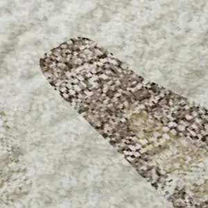 Photo of Ivory Beige And Khaki Abstract Washable Area Rug With UV Protection