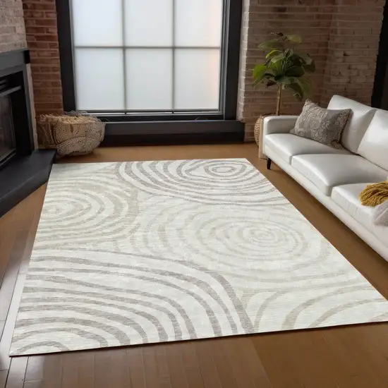 Ivory Beige And Khaki Abstract Washable Indoor Outdoor Area Rug Photo 9