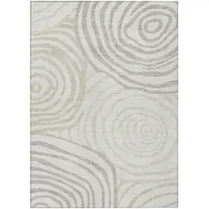 Photo of Ivory Beige And Khaki Abstract Washable Indoor Outdoor Area Rug