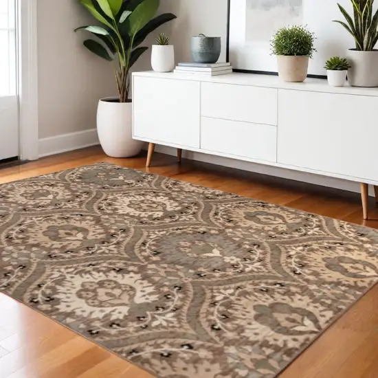 Beige And Ivory Floral Area Rug Photo 1