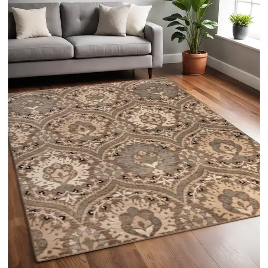 Beige And Ivory Floral Area Rug Photo 1