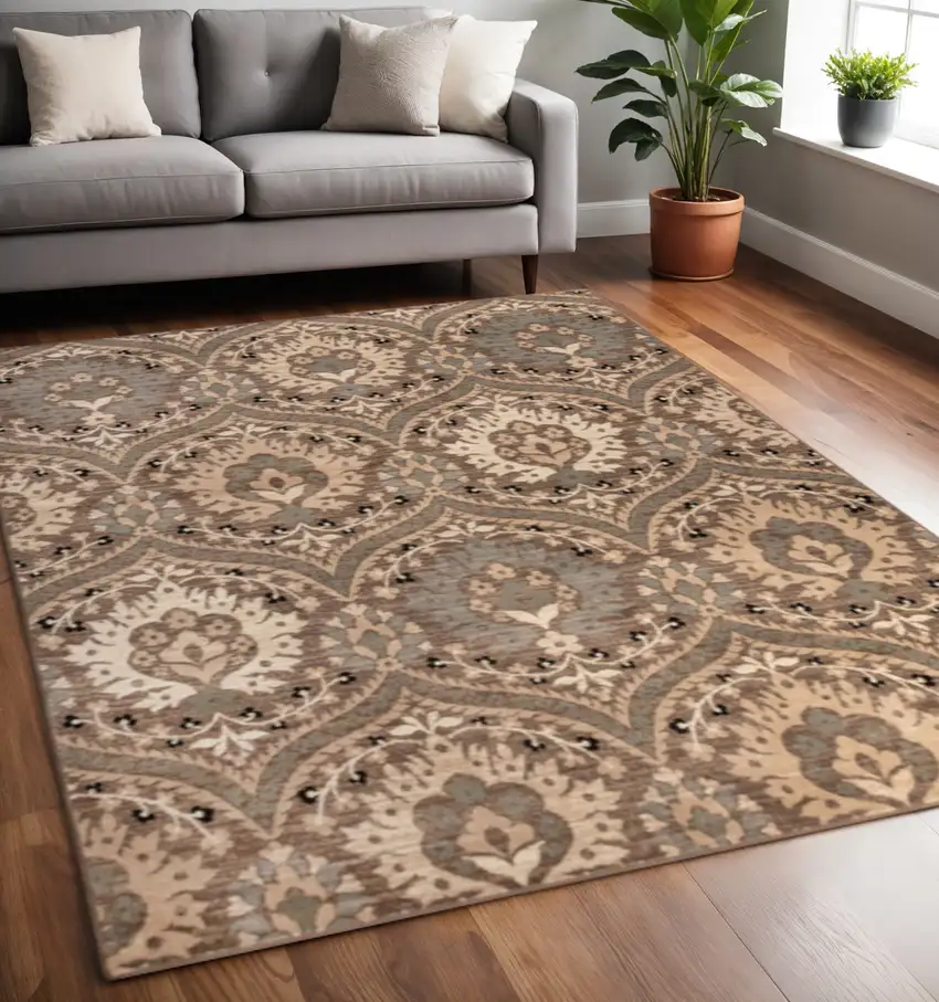 Beige And Ivory Floral Area Rug Photo 1