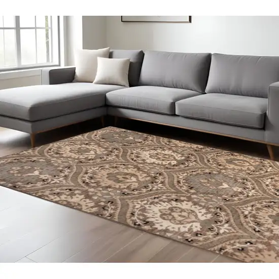 Beige And Ivory Floral Area Rug Photo 1