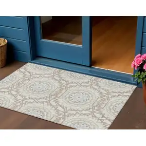 Photo of Ivory Beige And Silver Floral Medallion Washable Indoor Outdoor Area Rug