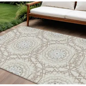 Photo of Ivory Beige And Silver Floral Medallion Washable Indoor Outdoor Area Rug