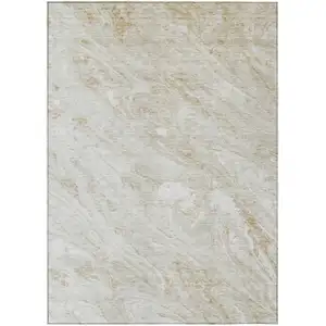 Photo of Ivory Beige And Tan Abstract Washable Indoor Outdoor Area Rug