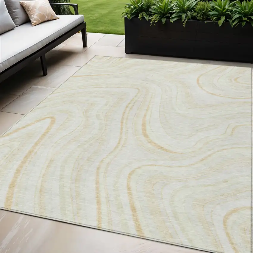 Ivory Beige And Tan Abstract Washable Indoor Outdoor Area Rug Photo 1