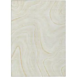 Photo of Ivory Beige And Tan Abstract Washable Indoor Outdoor Area Rug