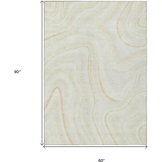 Ivory Beige And Tan Abstract Washable Indoor Outdoor Area Rug Photo 3