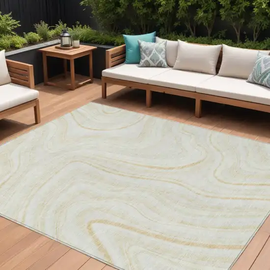 Ivory Beige And Tan Abstract Washable Indoor Outdoor Area Rug Photo 1