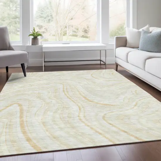 Ivory Beige And Tan Abstract Washable Indoor Outdoor Area Rug Photo 7