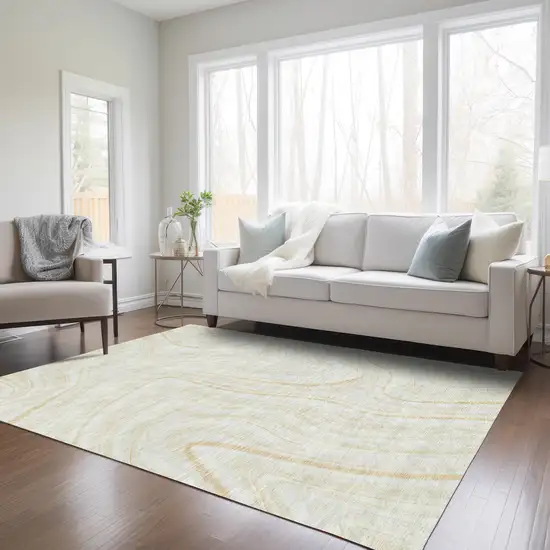 Ivory Beige And Tan Abstract Washable Indoor Outdoor Area Rug Photo 8