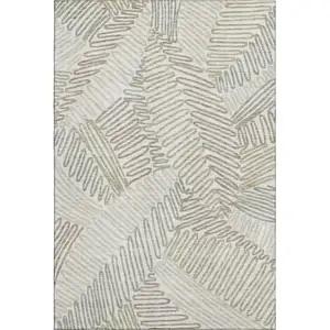 Photo of Ivory Beige And Tan Floral Washable Area Rug With UV Protection
