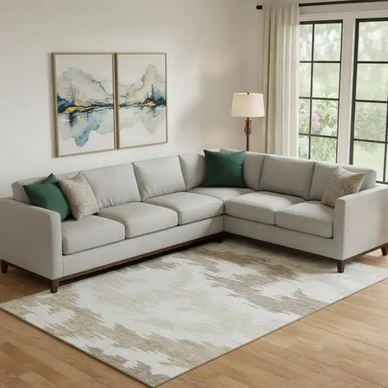 Ivory Beige And Taupe Abstract Washable Area Rug With UV Protection Photo 1