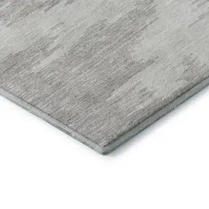 Photo of Ivory Beige And Taupe Abstract Washable Area Rug With UV Protection