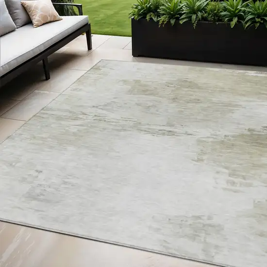 Ivory Beige And Taupe Abstract Washable Indoor Outdoor Area Rug Photo 1