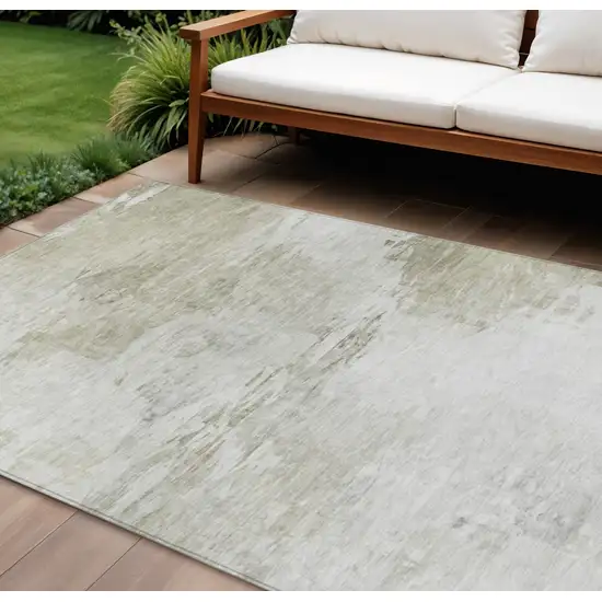 Ivory Beige And Taupe Abstract Washable Indoor Outdoor Area Rug Photo 1