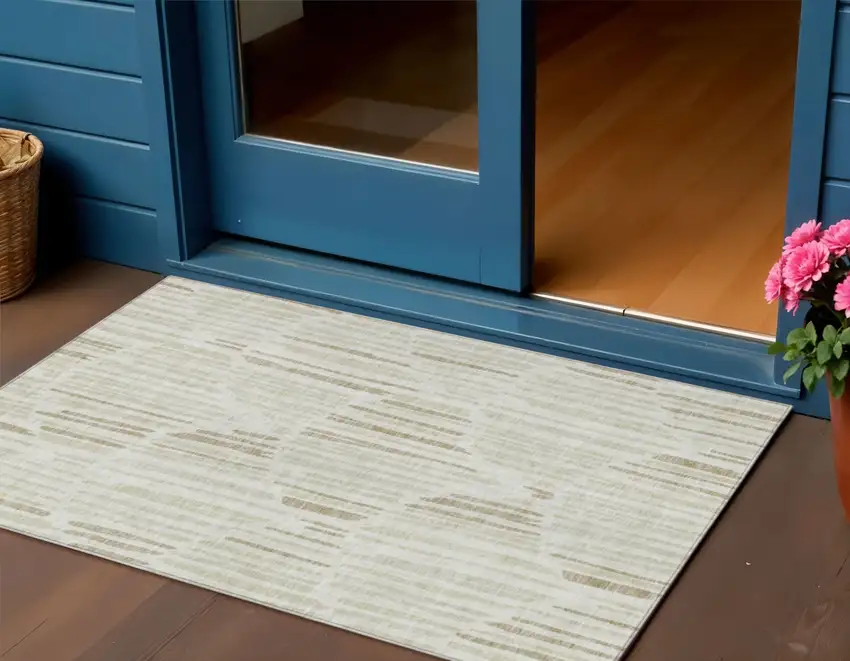 Ivory Beige And Taupe Abstract Washable Indoor Outdoor Area Rug Photo 1