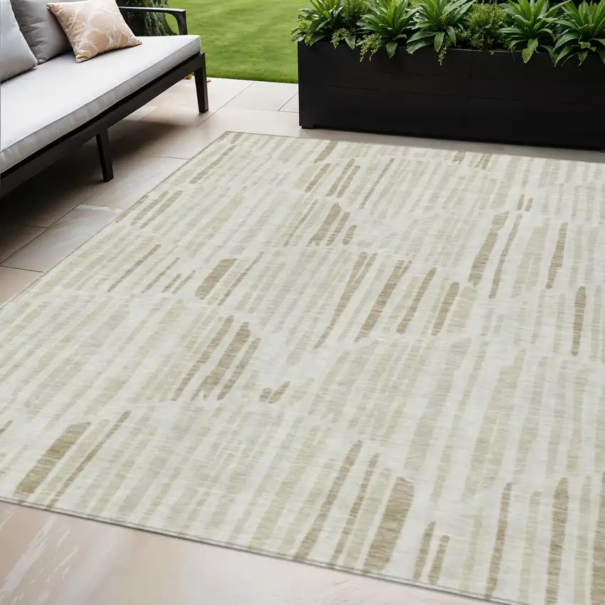 Ivory Beige And Taupe Abstract Washable Indoor Outdoor Area Rug Photo 1