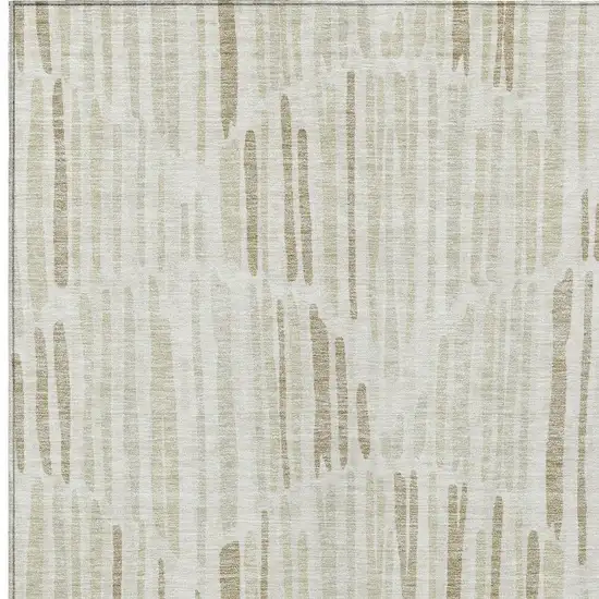 Ivory Beige And Taupe Abstract Washable Indoor Outdoor Area Rug Photo 4