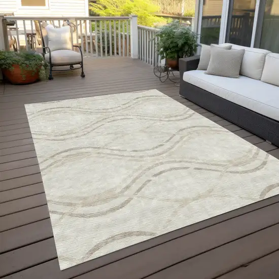 Ivory Beige And Taupe Abstract Washable Indoor Outdoor Area Rug Photo 9
