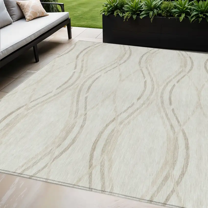 Ivory Beige And Taupe Abstract Washable Indoor Outdoor Area Rug Photo 1