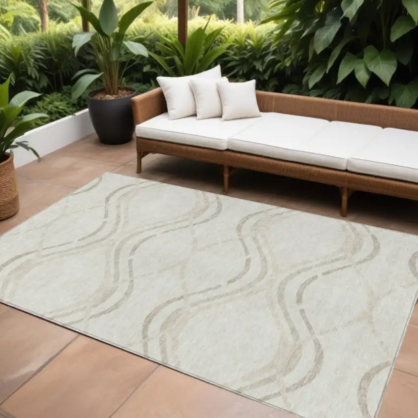 Ivory Beige And Taupe Abstract Washable Indoor Outdoor Area Rug Photo 1