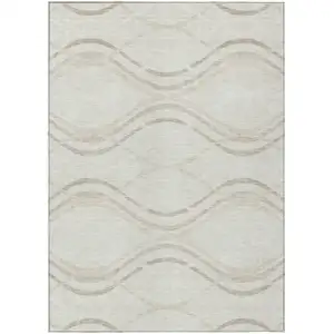 Photo of Ivory Beige And Taupe Abstract Washable Indoor Outdoor Area Rug