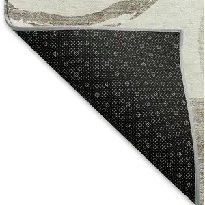 Photo of Ivory Beige And Taupe Geometric Washable Area Rug With UV Protection