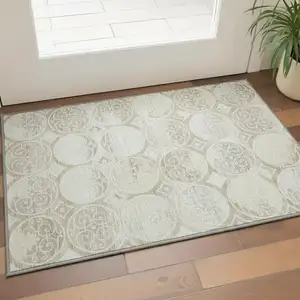 Photo of Ivory Beige And Taupe Medallion Washable Area Rug With UV Protection