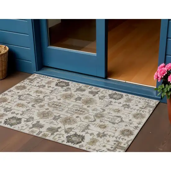 Ivory Beige And Taupe Oriental Washable Indoor Outdoor Area Rug Photo 1
