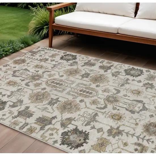 Ivory Beige And Taupe Oriental Washable Indoor Outdoor Area Rug Photo 1