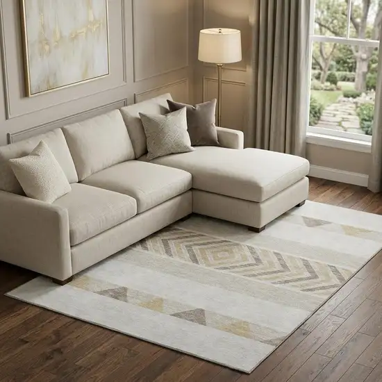 Ivory Beige And Taupe Southwestern Washable Area Rug With UV Protection Photo 1