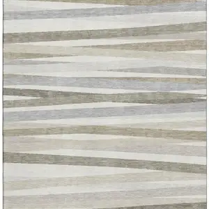 Photo of Ivory Beige And Taupe Striped Washable Area Rug With UV Protection