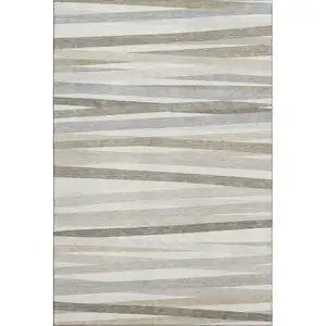 Photo of Ivory Beige And Taupe Striped Washable Area Rug With UV Protection